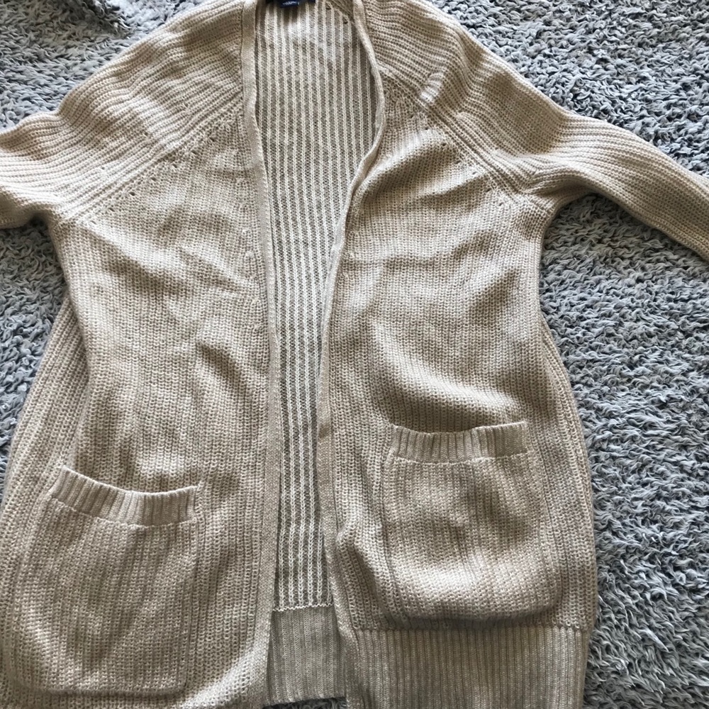 cream colored cardigan